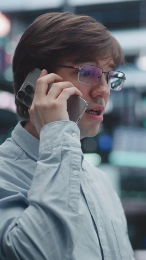 Focused Stock Broker Handling Communication Channels on Exchange Floor Stock Footage 330579523