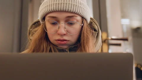 Focused student working. Student concentrating on coursework with caffeine Stock Footage 345538766