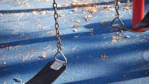 Focused swing set Stock Footage 122486756