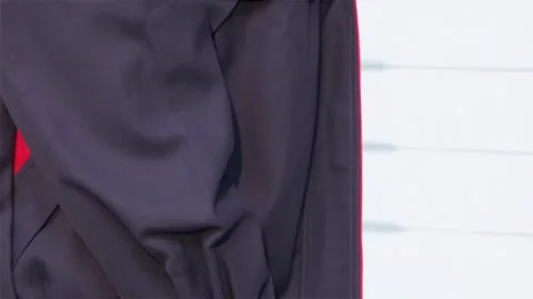 Focused technician adjusting work attire Video stock 311542273