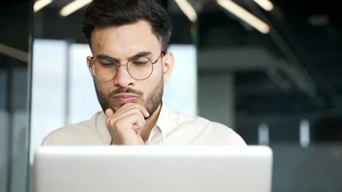 Focused thoughtful businessman thinking about problem solving while working  스톡 동영상 343356434