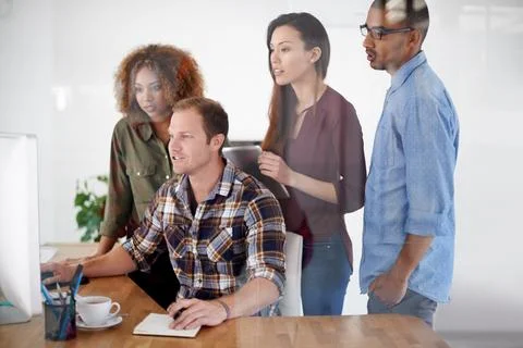 Focused on transforming the creative landscape. a team of designers working Stock Photos