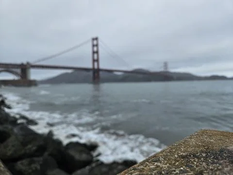 Focused View of a concrete block with background of Golden Gate Bridge Stock Photos