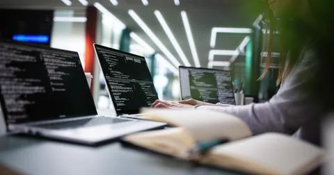 Focused Woman Creating Code Stock-Fotos