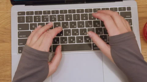 Focused work at bright desk. Efficient remote work with energetic vibe. Vivid Stock Footage 345512485