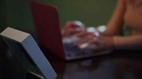 Focused Work Environment with a Laptop in the Comfort of Nighttime Hours Stock Footage 294919304