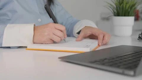 Focused Writing at a Minimalist Workspace A Creative Approach to NoteTaking Stock-Footage 317023825