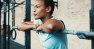 Focused Young African American Woman Leaning On Gym Weights Stock Footage