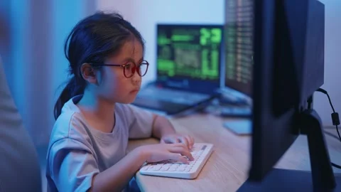 Focused Young Girl Engaged in Coding and Programming at Home with Computers.. Stock Footage 319928942