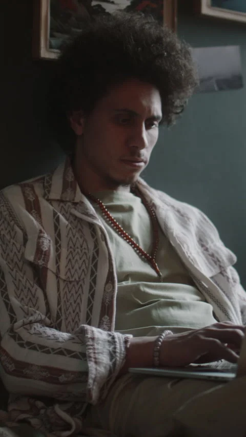 Focused Young Male Programmer Using Laptop while Working Remotely Stock-Footage 291239743