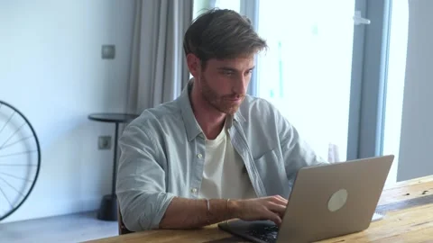 Focused Young Man Engaged in Productive Remote Wor 库存影片 333200791