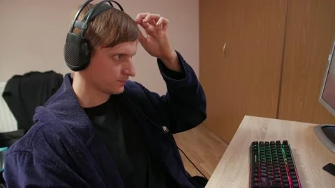 Focused Young Man Playing Computer Games Stock Footage 142139822