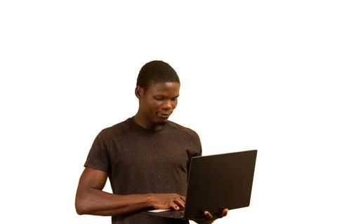 Focused Young Man Using Laptop Stock Photos