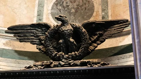 Focuses dark eagle statue tomb vittorio emanuele ii inside pantheon temple rome Stock Footage 319920544