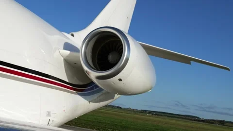 Focuses engine private jet essence air travel luxury circling rotating shot Stock Footage 293738321