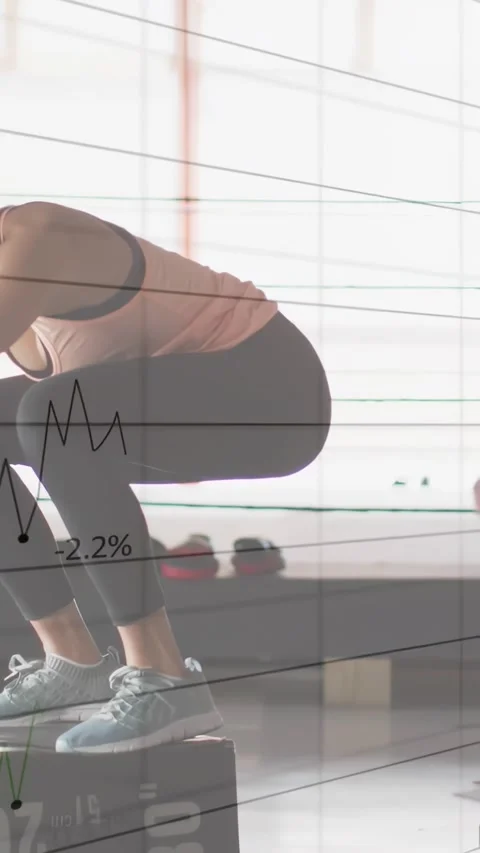 Focusing on 30" box, woman doing plyo jumps with overlays tracking progress, Stock Footage 331008959