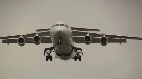 Focusing on approaching plane Stock Footage 8552207