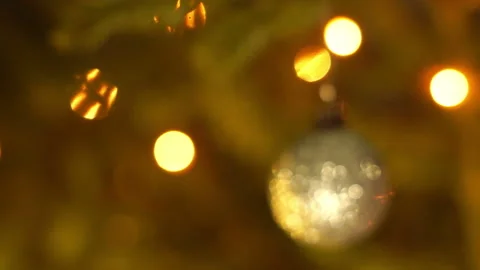 Focusing on the ball on a Christmas tree Stock Footage 100678212