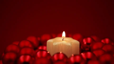 Focusing on burning christmas candle Stock-Footage 30706259