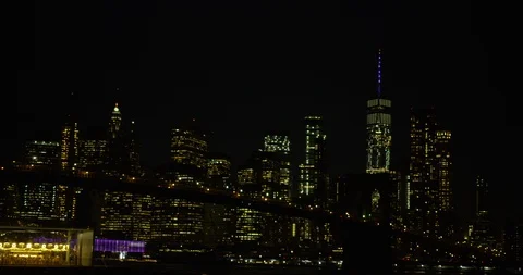 Focusing On The Famous Iconic Lit Up Brooklyn Bridge With Carousel At Night  Stock Footage 110579169