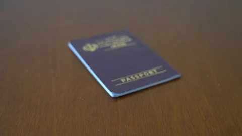 Focusing on an iranian passport Stock Footage 125534782