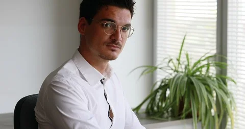 Focusing on a man at work with glasses Stock Footage 91446324