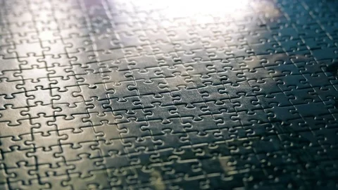 Focusing at the middle of complete jigsaw puzzle 스톡 동영상 73034184