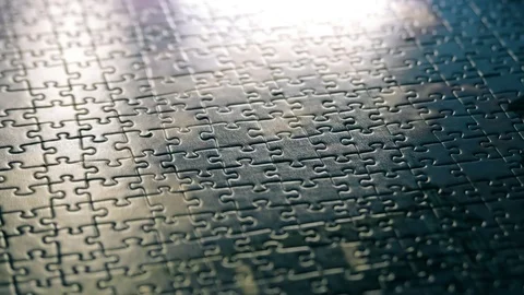 Focusing at the middle of complete jigsaw puzzle Video stock 73047173