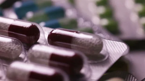 Focusing on pills in blister packages Stock Footage 6745156