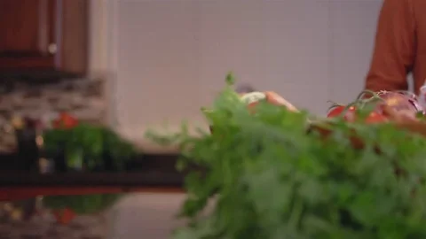 Focusing shot of some vegetables on a kitchen counter Stock Footage 83004021