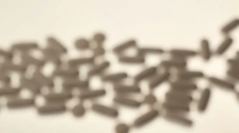 Focusing on some pills Stock Footage 32243871