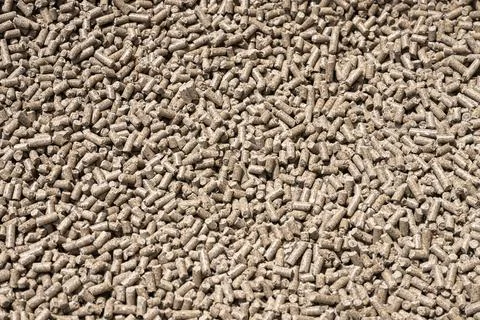 Fodder dry chunks for cows on a dairy farm .Fodder dry chunks for cows on a.. Stock Photos