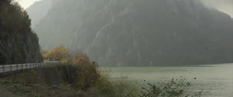 Fog above Danube river in narrow gorge 4K scope video Stock Footage 324625764