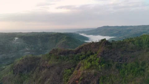 Fog Above River adn Around Mountains Stock Footage 246794012