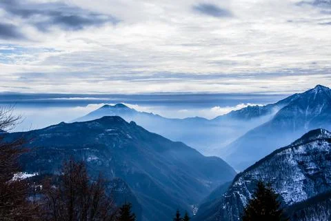 Fog in the alpine valleys Stock Photos