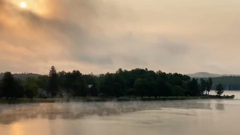 Fog and Clouds dance across water Stock Footage 284872851