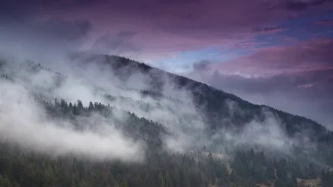 Fog and clouds mountain valley landscape. Magic evening at mountains range Stock Footage 74837406
