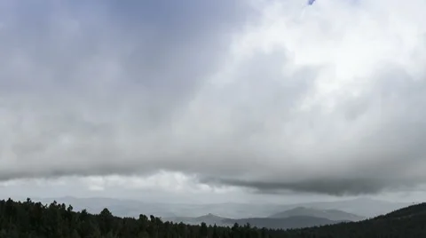 Fog and clouds over a mountains.  Time lapse. Stock Footage 47981148