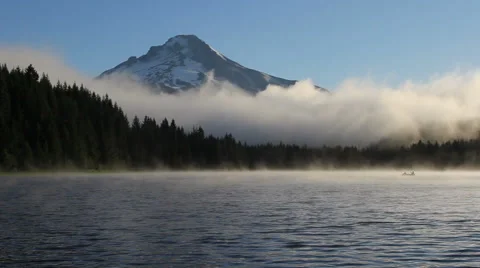 Fog and Clouds Over Trillium Lake with Mount Hood in Oregon at Sunrise 1080p Stock Footage 40704627