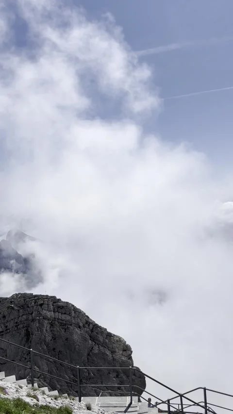 Fog and clouds surrounding Sntis mountain Stock Footage 306065752