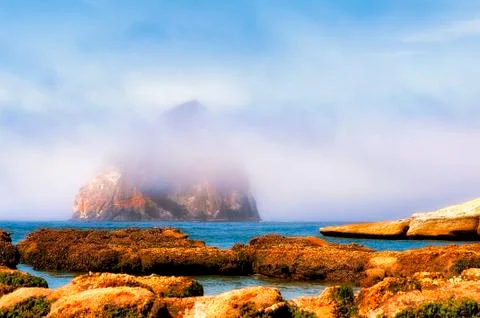 Fog and Haystack Rock at Cape Kiwanda Stock Photos