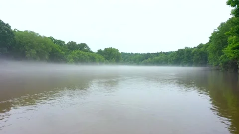 Fog and mist weather effect over Chattahoochee River near Franklin GA Stock Footage 158165185