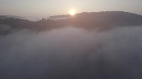 Fog and mountains in the morning Stock Footage 229371908