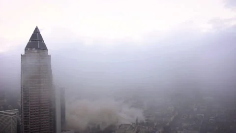 Fog and Smoke after Exploding University Tower in Frankfurt  - Aerial Video stock 135678995