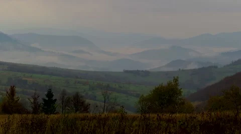 Fog between mountains Stock Footage 68807114