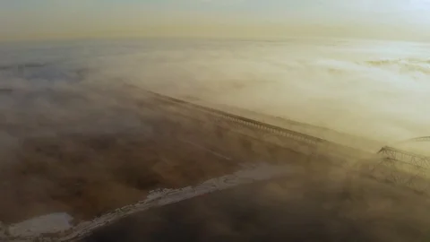 Fog bridge over the Volga river traffic view from the drone Stock Footage 127533598
