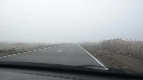 Fog. The car rides at speed on the road in thick fog in morning. Stock Footage 120109309