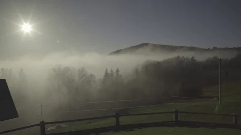 Fog catches up a mountain quickly Video stock 74697213