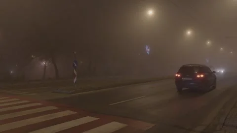 Fog in the city traffic Stock Footage 298482570