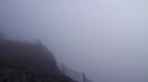 FOG CLEARING ON A MOUNTAIN Stock Footage 46468848
